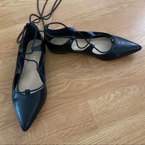 Black ballet flats with tie detail